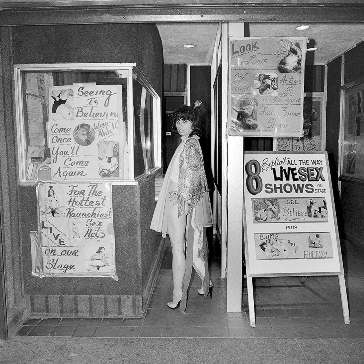 Meryl Meisler, Street Walker Street Photography Book Published by Eyeshot: Judi Jupiter Seeing is Believing, Times Square, NY, NY, June 1978